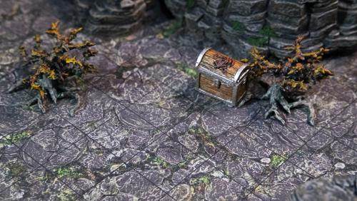Nettlegorse plants and treasure chest atop mountain terrain tray